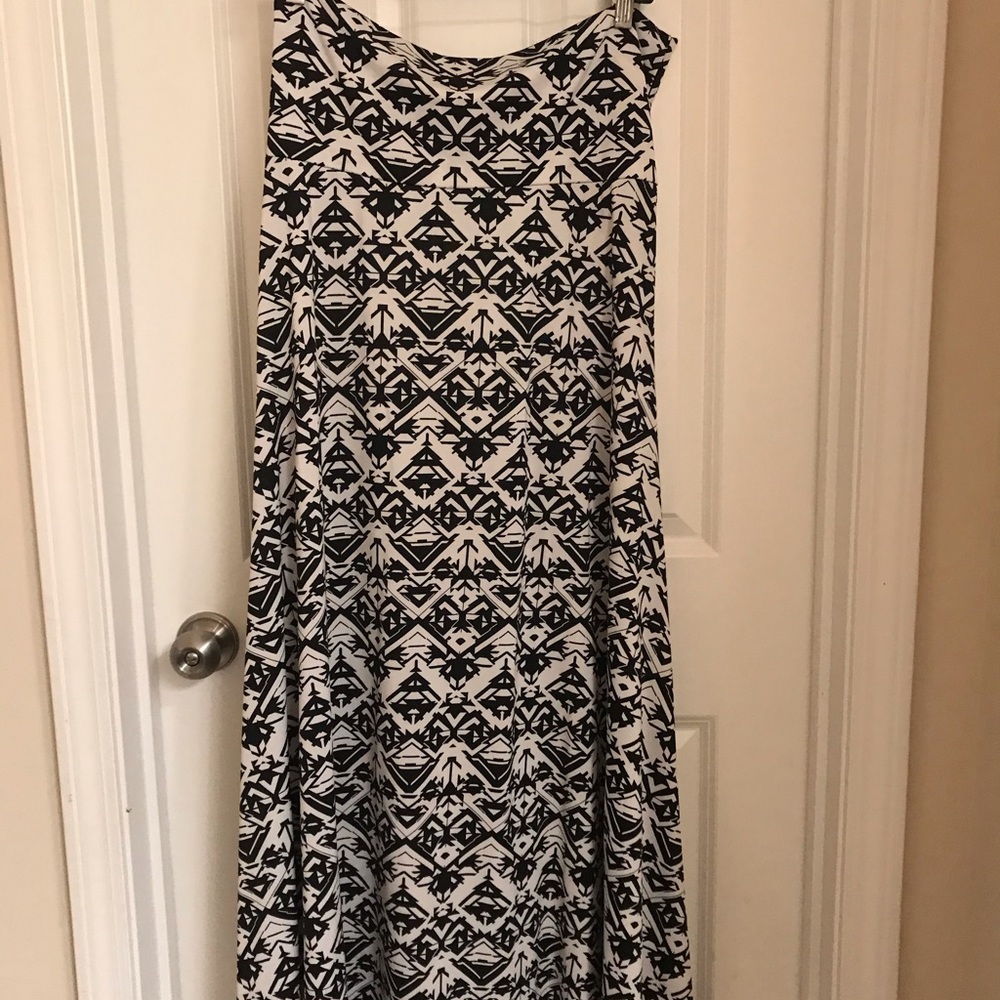Long skirt or can be pulled up as a halter dress